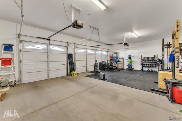 garage featuring a garage door opener