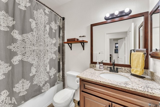 full bathroom featuring vanity, toilet, and shower / bath combo with shower curtain