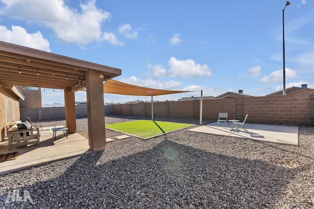 view of yard with a patio area