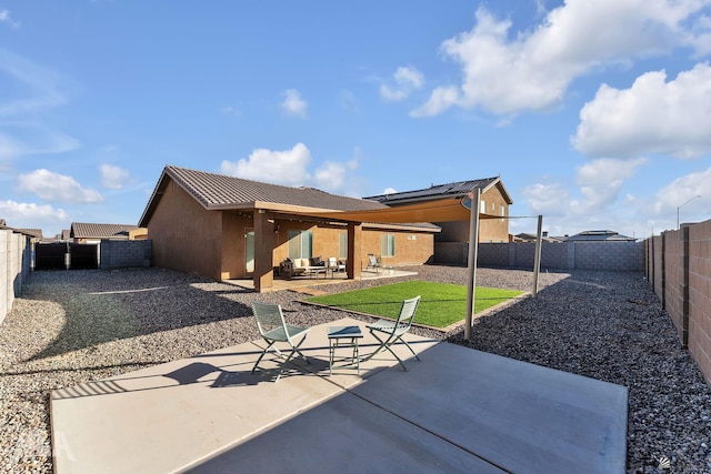 back of property with a patio area