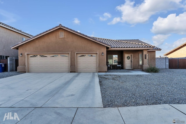 view of front of home with a garage