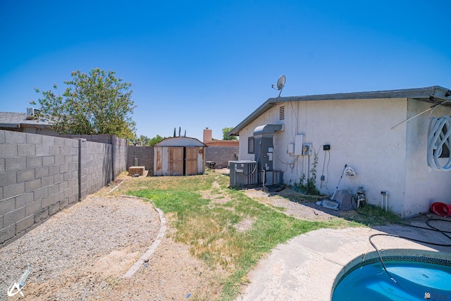 2651 S Olivia Ave, Yuma, AZ 85365 - fenced backyard featuring a shed and a swimming pool