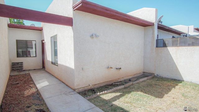 1700 S Crowder Ave Unit # 27, Yuma, AZ 85364 - view of side of home featuring stucco siding