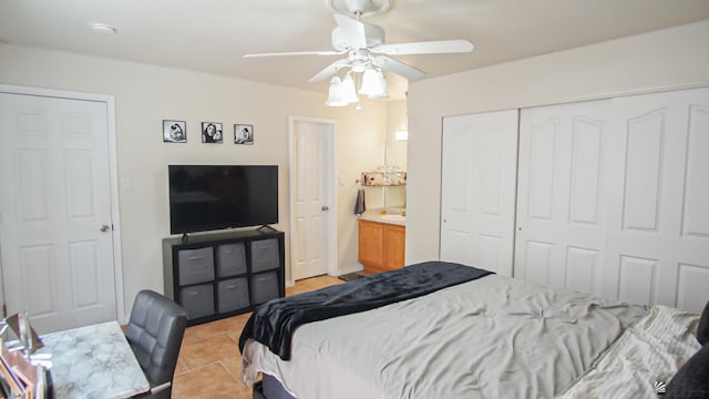 1700 S Crowder Ave Unit # 27, Yuma, AZ 85364 - bedroom featuring ceiling fan, light tile patterned floors, and a closet