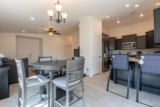 11602 E 33rd St, Yuma, AZ 85367 - dining space featuring visible vents, recessed lighting, ceiling fan with notable chandelier, and light tile patterned flooring