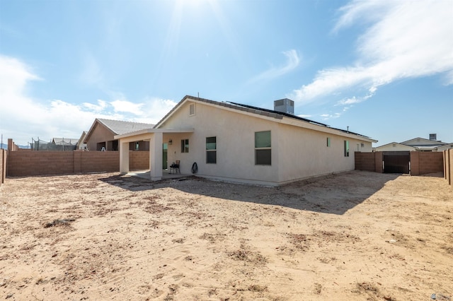 11602 E 33rd St, Yuma, AZ 85367 - rear view of property with a patio, central AC, and a fenced backyard