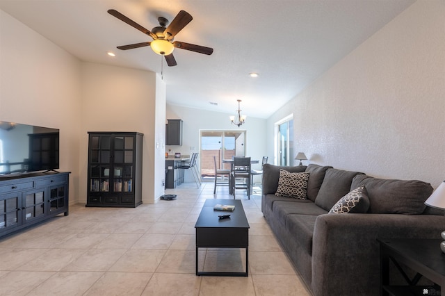 11602 E 33rd St, Yuma, AZ 85367 - living area with light tile patterned floors, baseboards, ceiling fan with notable chandelier, lofted ceiling, and recessed lighting