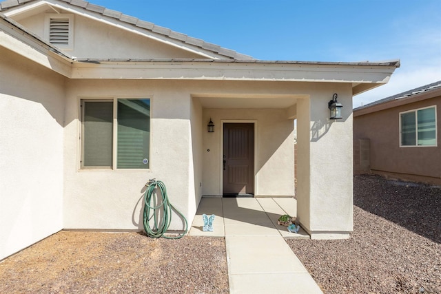 11602 E 33rd St, Yuma, AZ 85367 - view of exterior entry featuring stucco siding