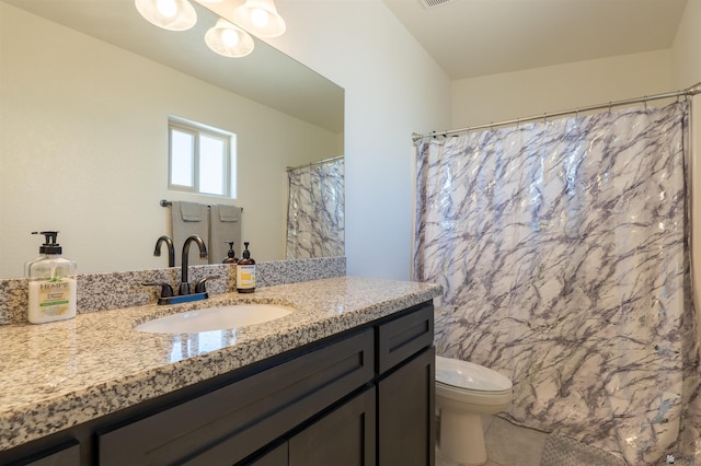 11602 E 33rd St, Yuma, AZ 85367 - bathroom with vanity, tile patterned floors, and toilet