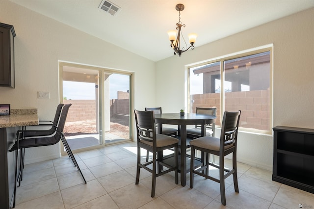 11602 E 33rd St, Yuma, AZ 85367 - dining room with visible vents, lofted ceiling, a wealth of natural light, and an inviting chandelier