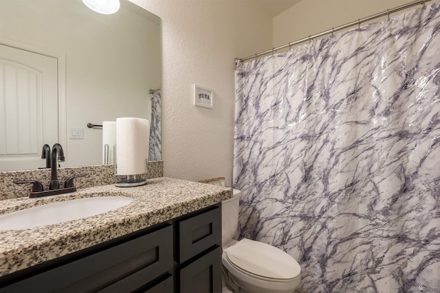 11602 E 33rd St, Yuma, AZ 85367 - bathroom with vanity, a shower with shower curtain, and toilet