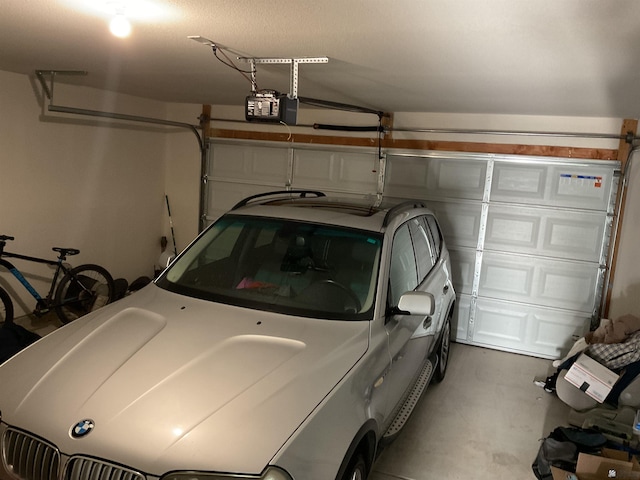 garage featuring a garage door opener