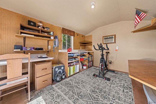 1215 S 41st Dr, Yuma, AZ 85364 - exercise room with vaulted ceiling, an AC wall unit, and baseboards