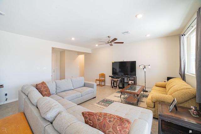 living area featuring baseboards, visible vents, ceiling fan, and recessed lighting