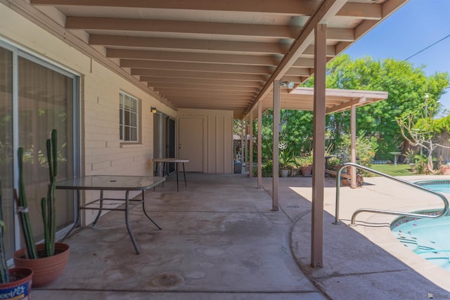 view of patio / terrace with an outdoor pool
