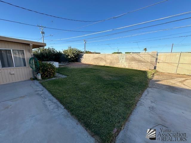 view of yard featuring fence