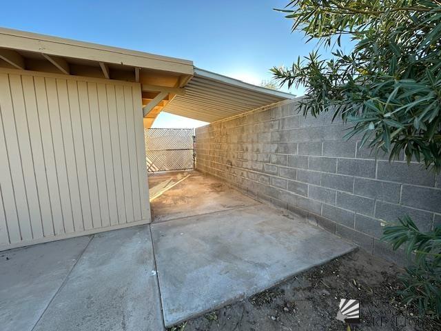 view of patio with fence