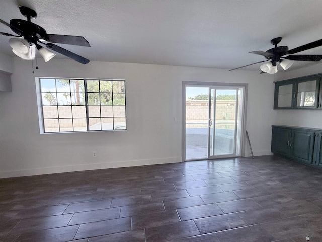 2472 S 18th Ave, Yuma, AZ 85364 - spare room with a ceiling fan, wood finish floors, and baseboards