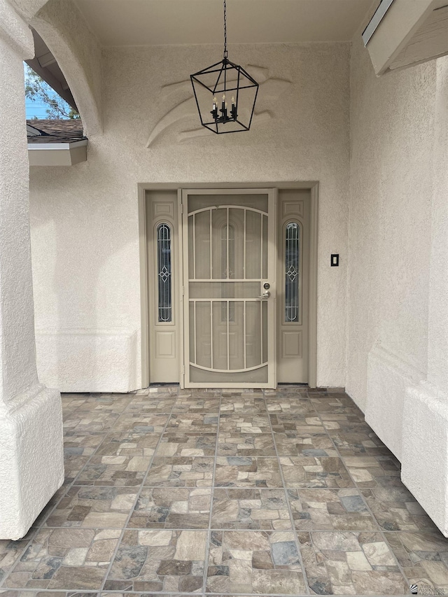 2472 S 18th Ave, Yuma, AZ 85364 - view of exterior entry with stucco siding