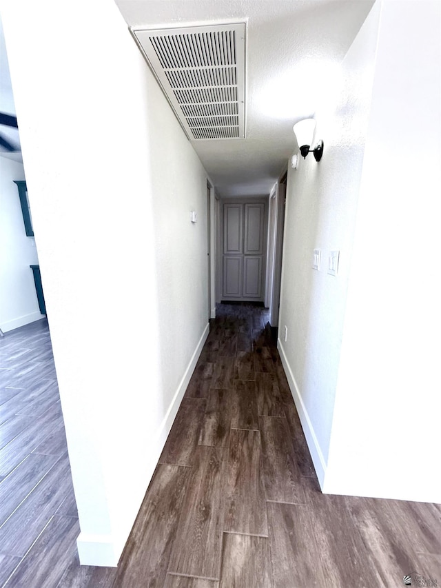 2472 S 18th Ave, Yuma, AZ 85364 - hall with wood finished floors and baseboards