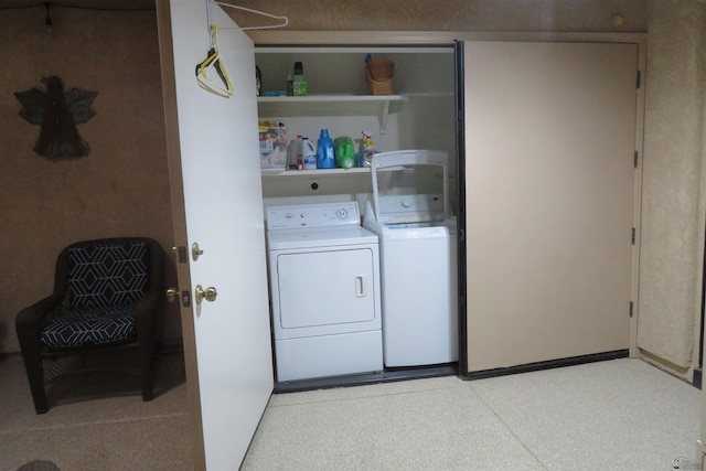 washroom with washer and clothes dryer