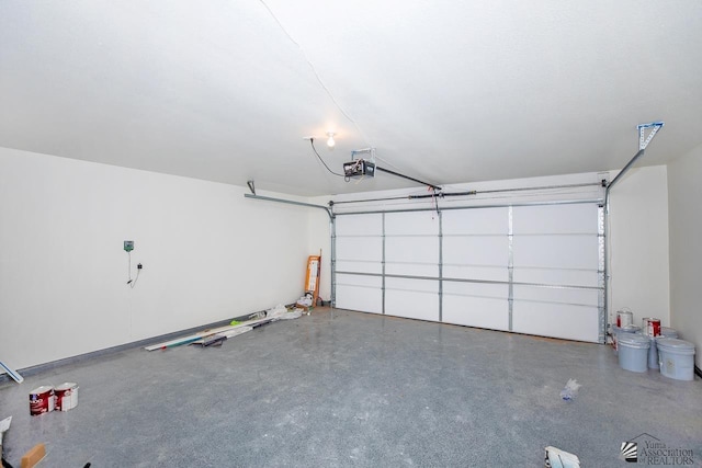 garage featuring a garage door opener