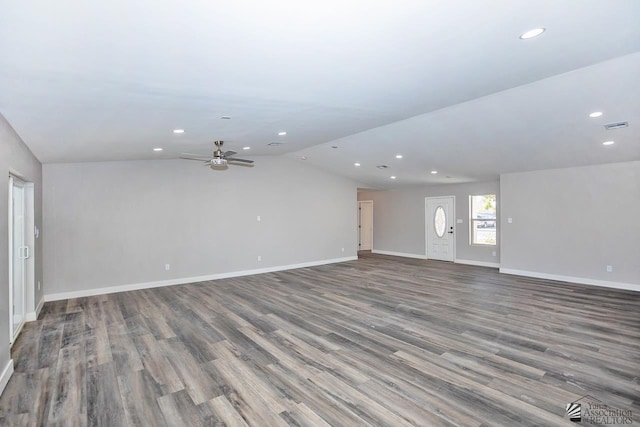 unfurnished living room featuring hardwood / wood-style flooring, ceiling fan, and lofted ceiling