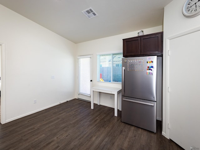 7335 E 36th Rd, Yuma, AZ 85365 - kitchen with freestanding refrigerator, dark brown cabinets, and dark wood-type flooring