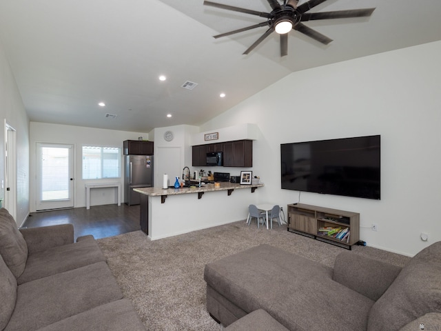 7335 E 36th Rd, Yuma, AZ 85365 - living area featuring vaulted ceiling, a ceiling fan, recessed lighting, and dark colored carpet