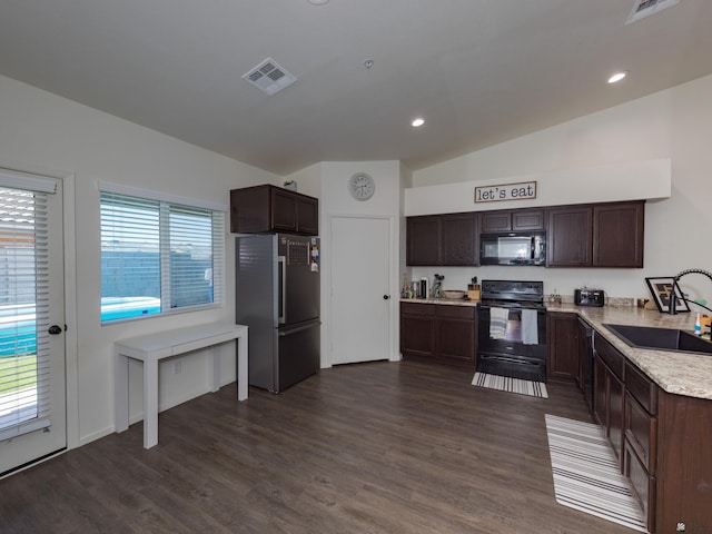 7335 E 36th Rd, Yuma, AZ 85365 - kitchen featuring black appliances, dark brown cabinets, light countertops, dark wood finished floors, and lofted ceiling