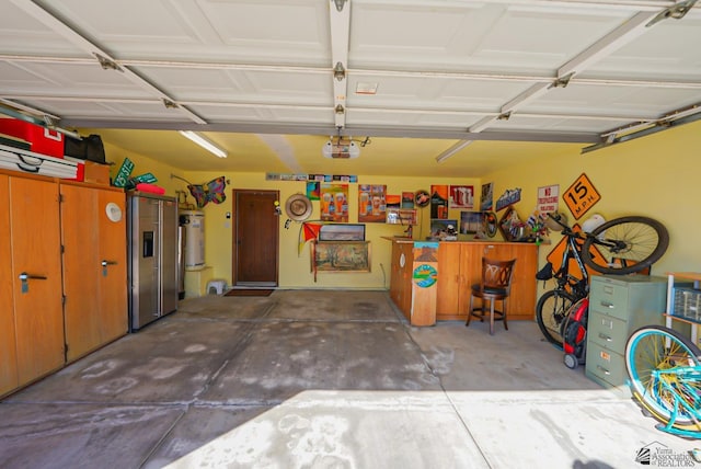 garage with stainless steel fridge with ice dispenser, a garage door opener, and water heater
