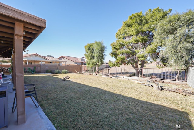 view of yard with a fenced backyard