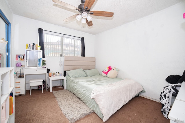 2556 W 14th St, Yuma, AZ 85364 - carpeted bedroom featuring a textured ceiling and ceiling fan