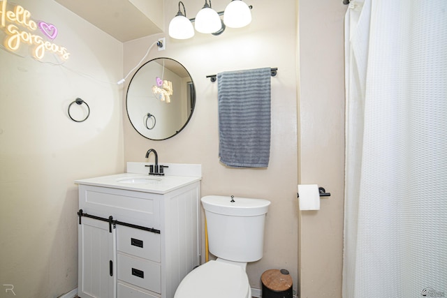 2556 W 14th St, Yuma, AZ 85364 - bathroom featuring vanity, toilet, and curtained shower