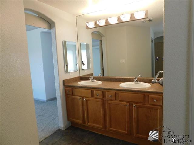 11785 E 27th Pl, Yuma, AZ 85367 - bathroom with double vanity and tile patterned floors