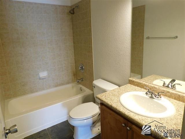 11785 E 27th Pl, Yuma, AZ 85367 - full bath with toilet, bathtub / shower combination, a textured wall, vanity, and tile patterned floors