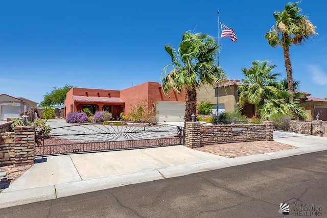 13400 S Onammi Ave, Yuma, AZ 85367 - view of front of property featuring stucco siding and a gate