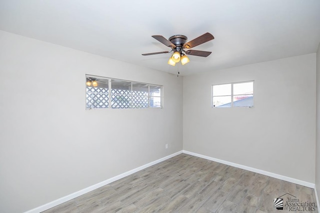 2735 S Mesa Ave, Yuma, AZ 85364 - spare room with baseboards, light wood-style flooring, and ceiling fan