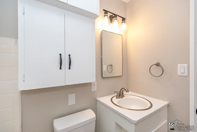 2735 S Mesa Ave, Yuma, AZ 85364 - bathroom featuring vanity and toilet