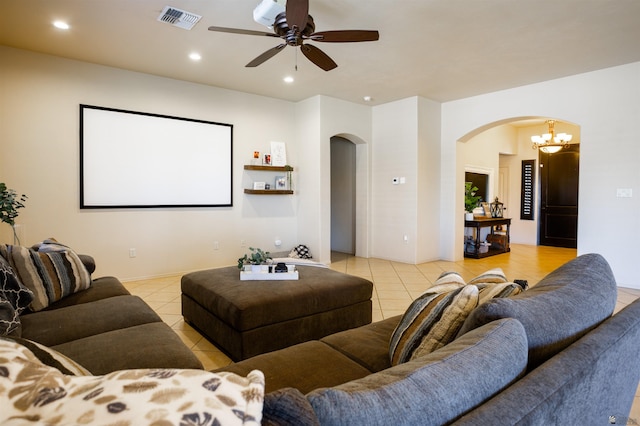 7942 E 36th Ln, Yuma, AZ 85365 - cinema room featuring arched walkways, light tile patterned floors, ceiling fan, recessed lighting, and a chandelier