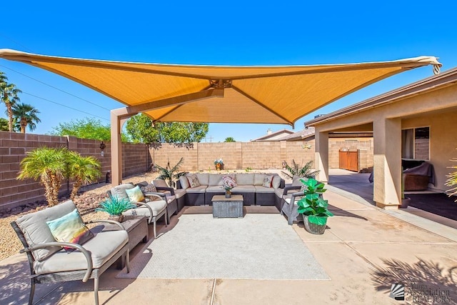 view of patio with a fenced backyard and outdoor lounge area