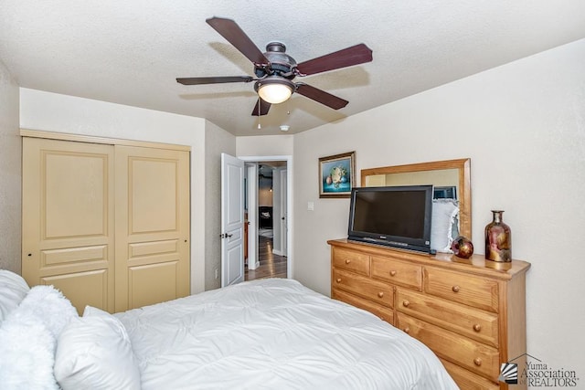 bedroom with a closet and ceiling fan