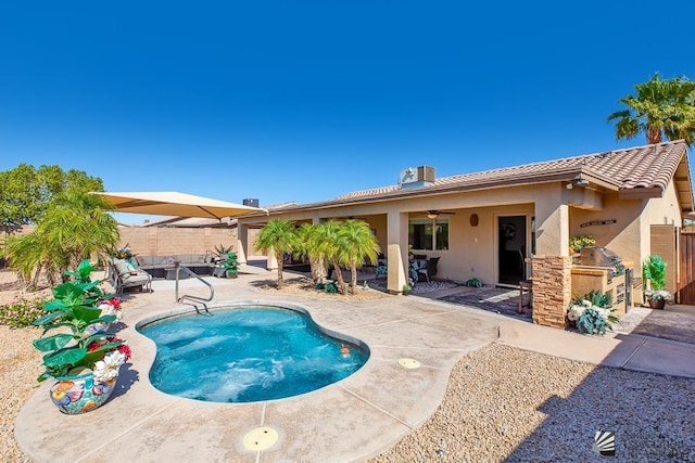 view of swimming pool with area for grilling, a fenced backyard, a fenced in pool, a ceiling fan, and a patio