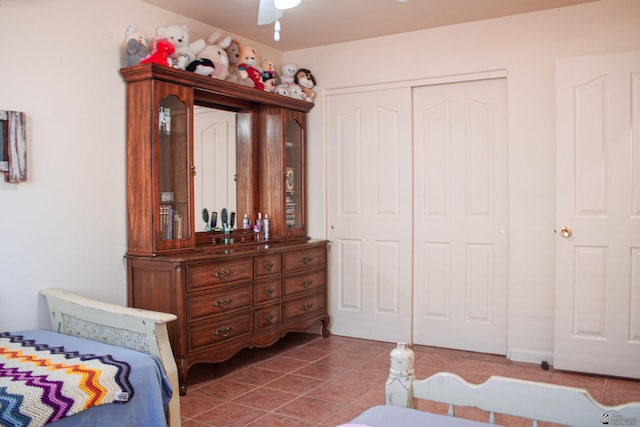 bedroom featuring a closet and tile patterned flooring