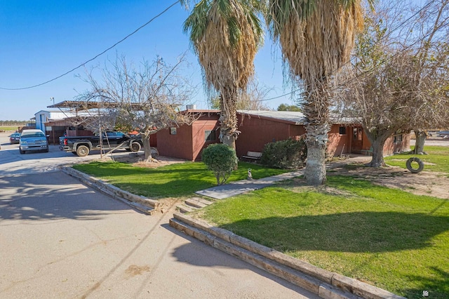 view of front of home with a front yard