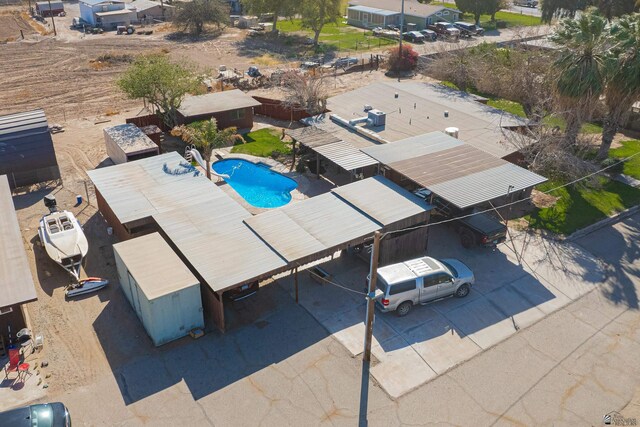 drone / aerial view of a pool