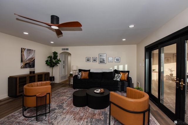 2172 S Terrace Way, Yuma, AZ 85364 - living room featuring arched walkways, wood finished floors, recessed lighting, ceiling fan, and baseboards
