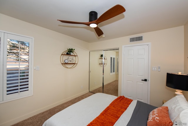 2172 S Terrace Way, Yuma, AZ 85364 - carpeted bedroom with baseboards, a closet, and a ceiling fan