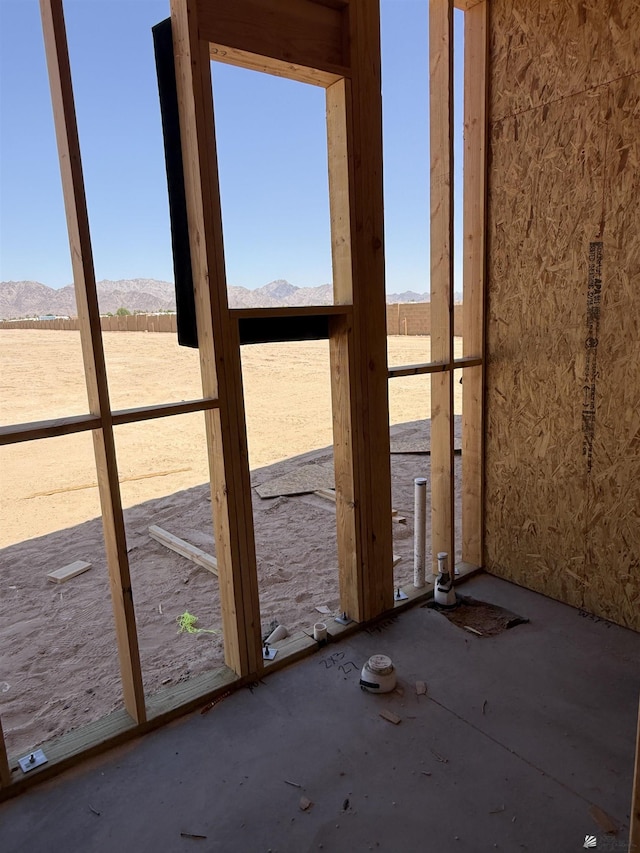 12585 E 51st Ln, Yuma, AZ 85367 - unfurnished sunroom featuring a mountain view