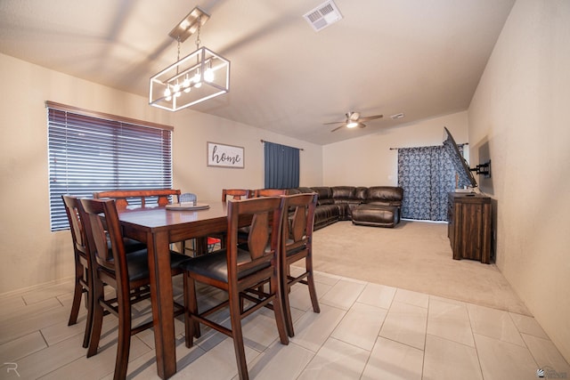 7850 E 44th Pl, Yuma, AZ 85365 - dining room featuring light carpet, a ceiling fan, and visible vents